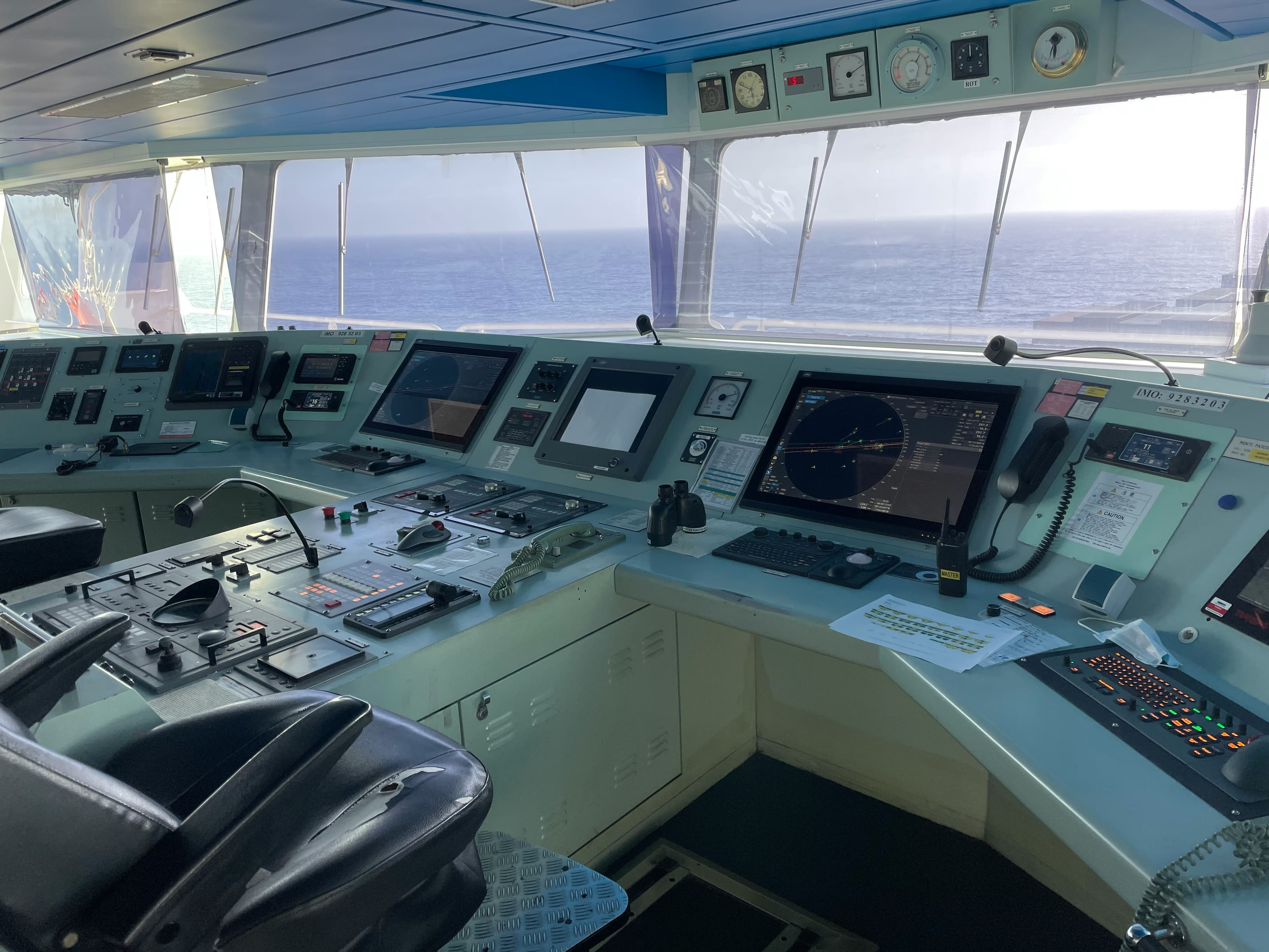 Command console with monitoring screens used for centralized public fleet oversight